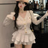 Classic Style White Pure Desire Slimming Hot Girl Suit showcased by a model wearing a stylish button-up top and ruffled skirt.